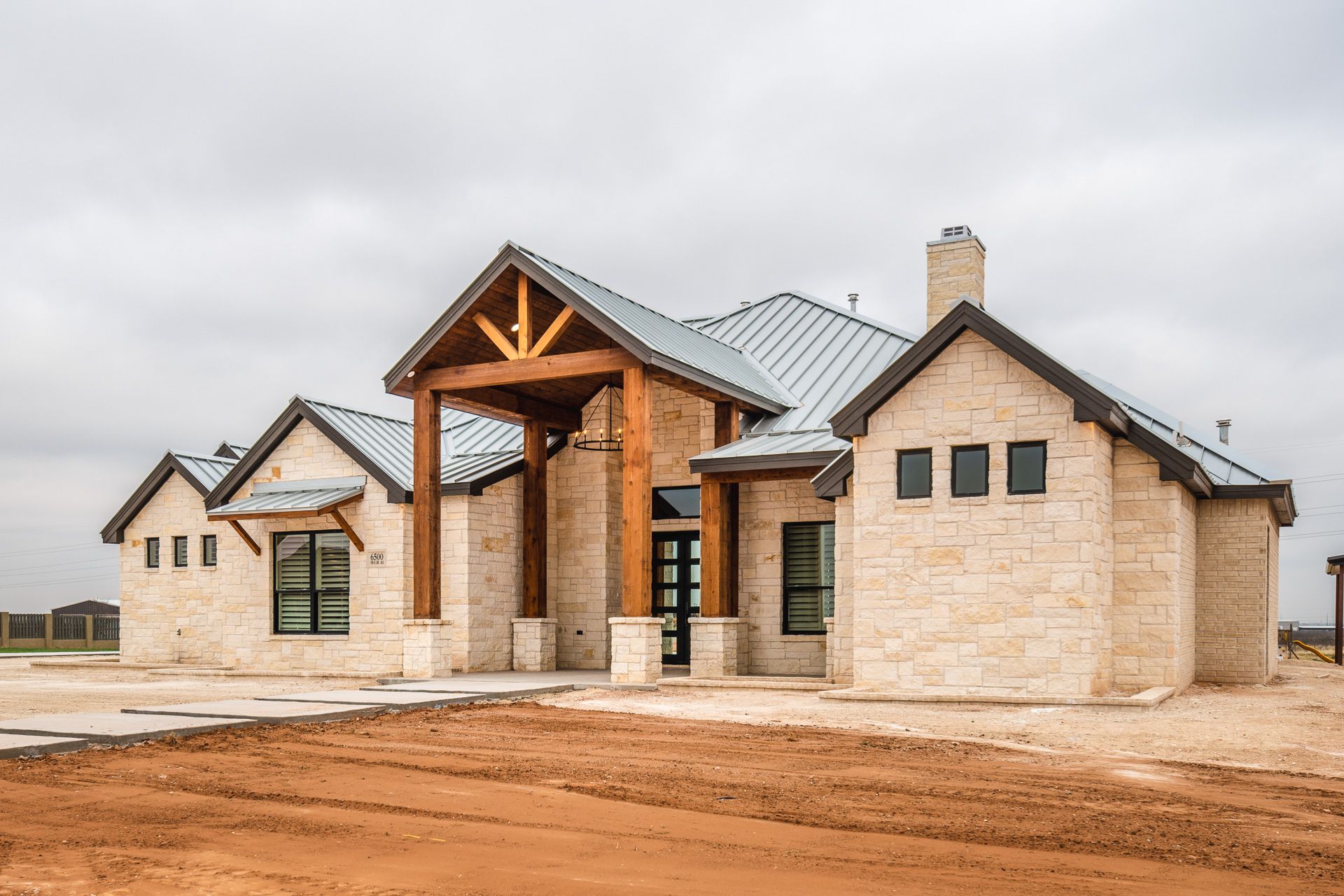 Diamond Homes custom home exterior at dusk in West Texas