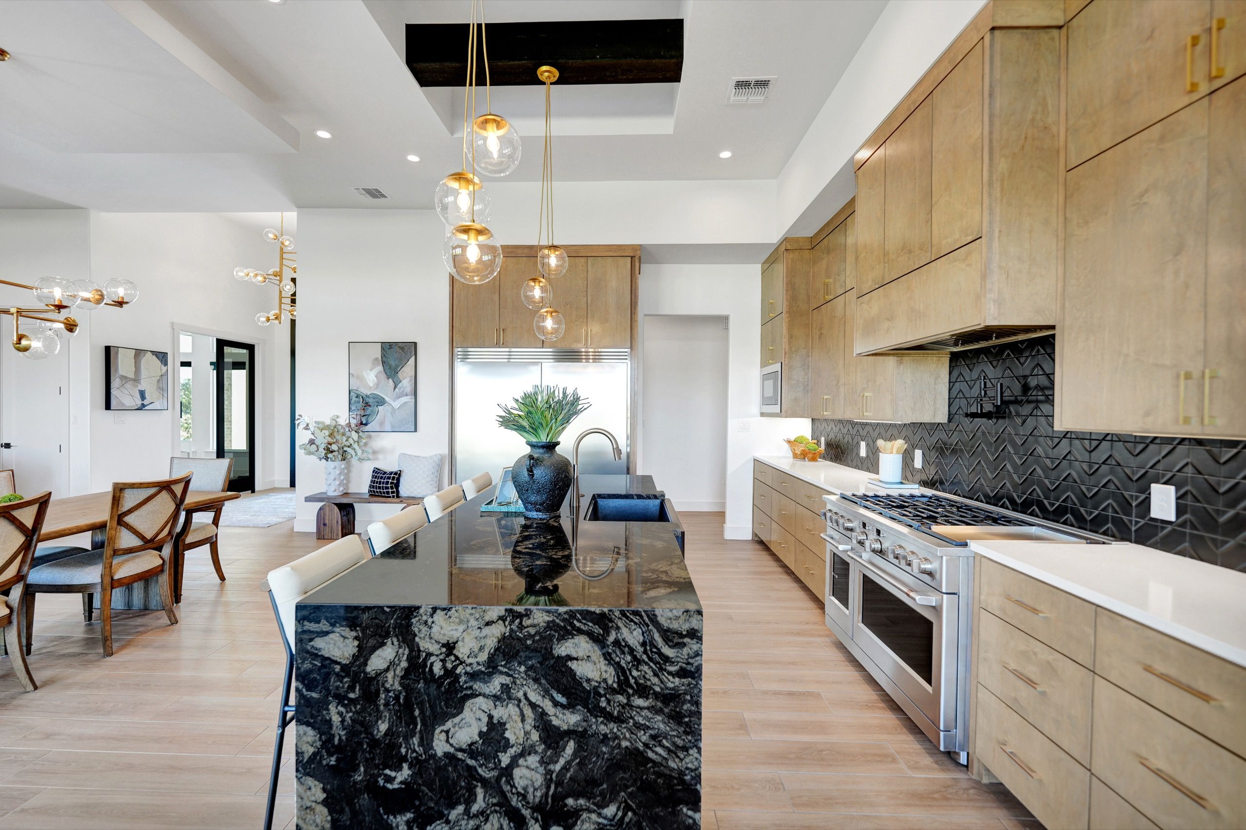 Luxury kitchen with white cabinets in Midland, TX custom home